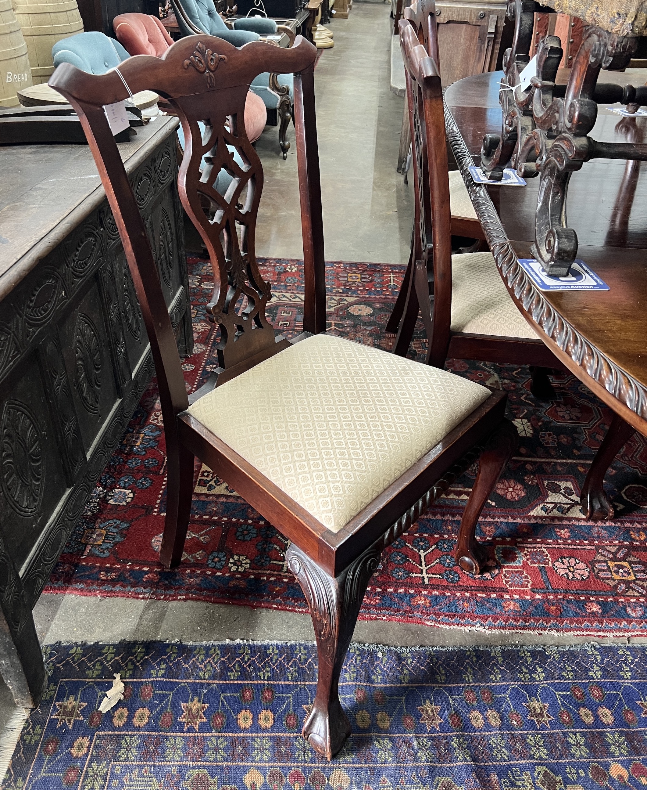 A set of six Chippendale style mahogany dining chairs